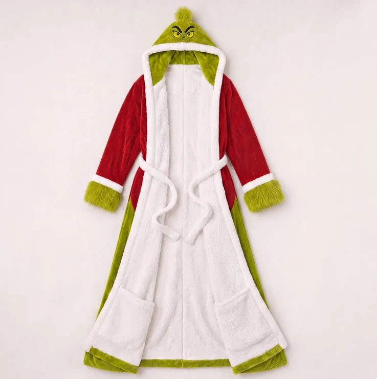 Peignoir-couverture rouge et vert présenté à plat avec sa doublure blanche